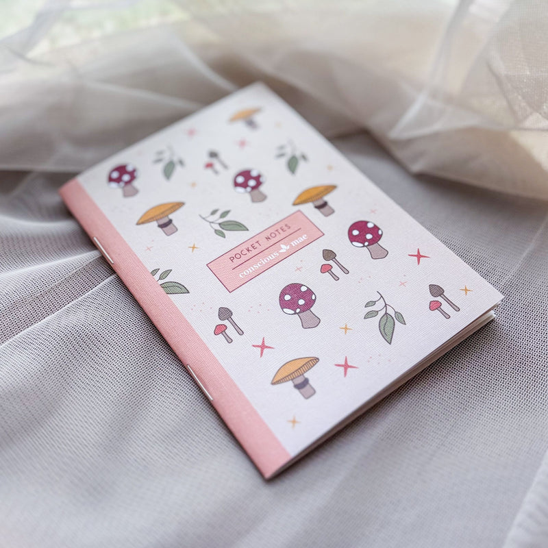 Mushroom illustrated mini pocket notebook, neutral tones.